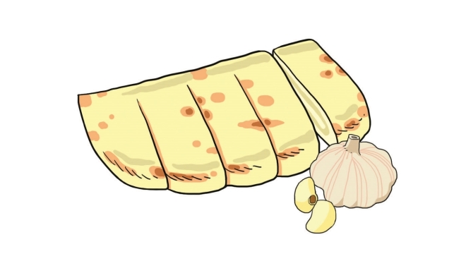 Garlic naan, czyli bardziej puszysty placek z aromatycznym kopem czosnku w środku. Czasem czosnek jest na górze i wtedy ma tendencję do przypalania. Dostaniecie do tego curry i daal (sos z soczewicy) Cena: 2-5 RM